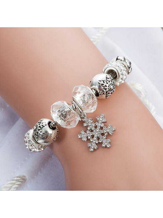 Pulsera de Charms con estrella de la Navidad como adorno central.